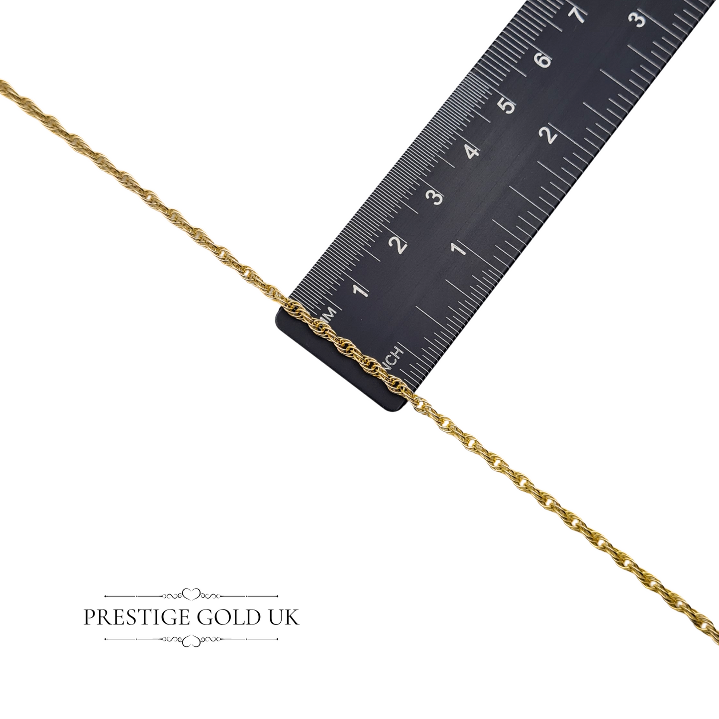 Measurement of the chain’s 2mm width against a ruler, perfect for accurate size reference.