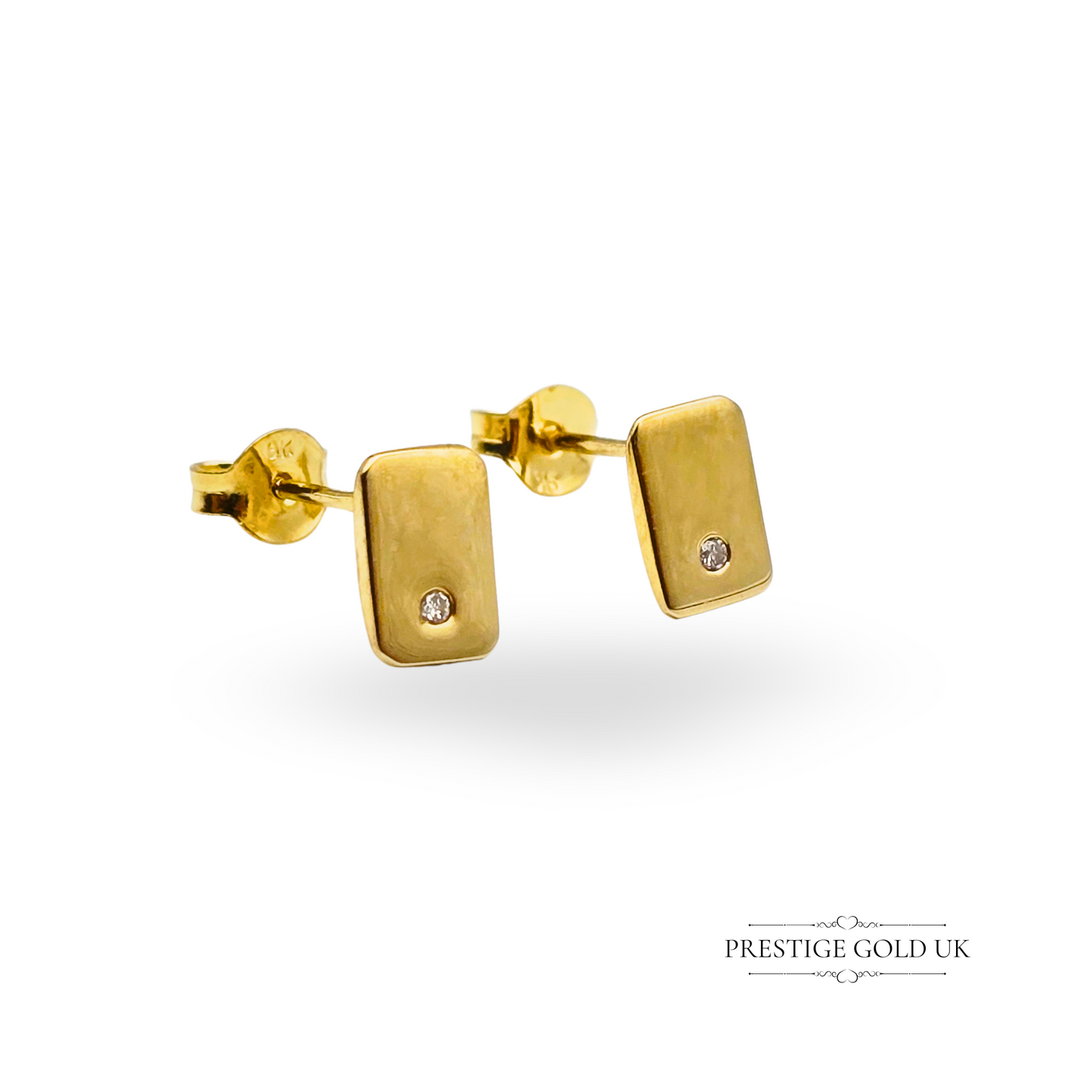 Pair of vintage 9ct yellow gold stud earrings with rectangular shape and single inset diamond, fully hallmarked in Sheffield, measuring 7x5mm and weighing 1.3g, shown on model and individually for scale and detail.
