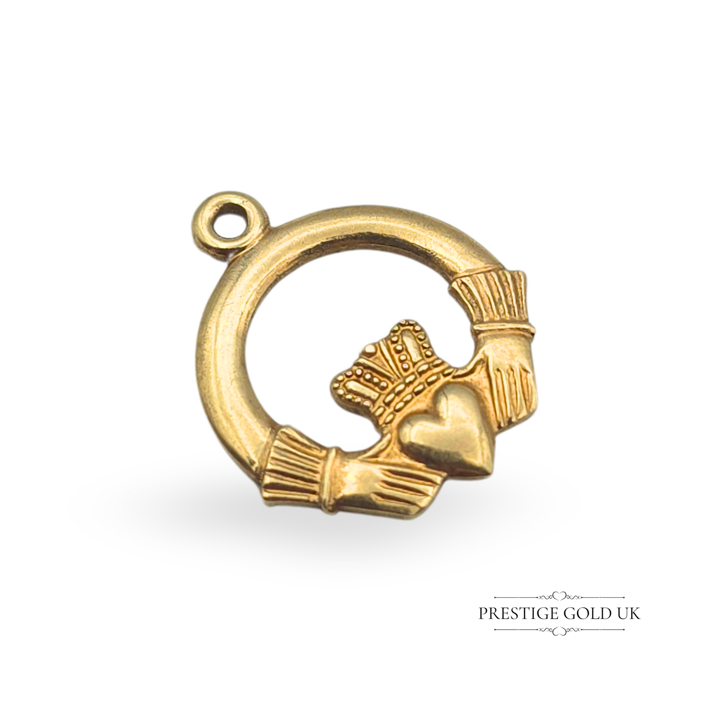 A vintage 9ct gold Claddagh charm pendant featuring the classic Irish symbol of love, loyalty, and friendship, with a heart, crown, and hands design. Fully hallmarked and measuring 18mm tall by 15mm wide, this Celtic jewellery piece makes a meaningful gift or collector’s item.