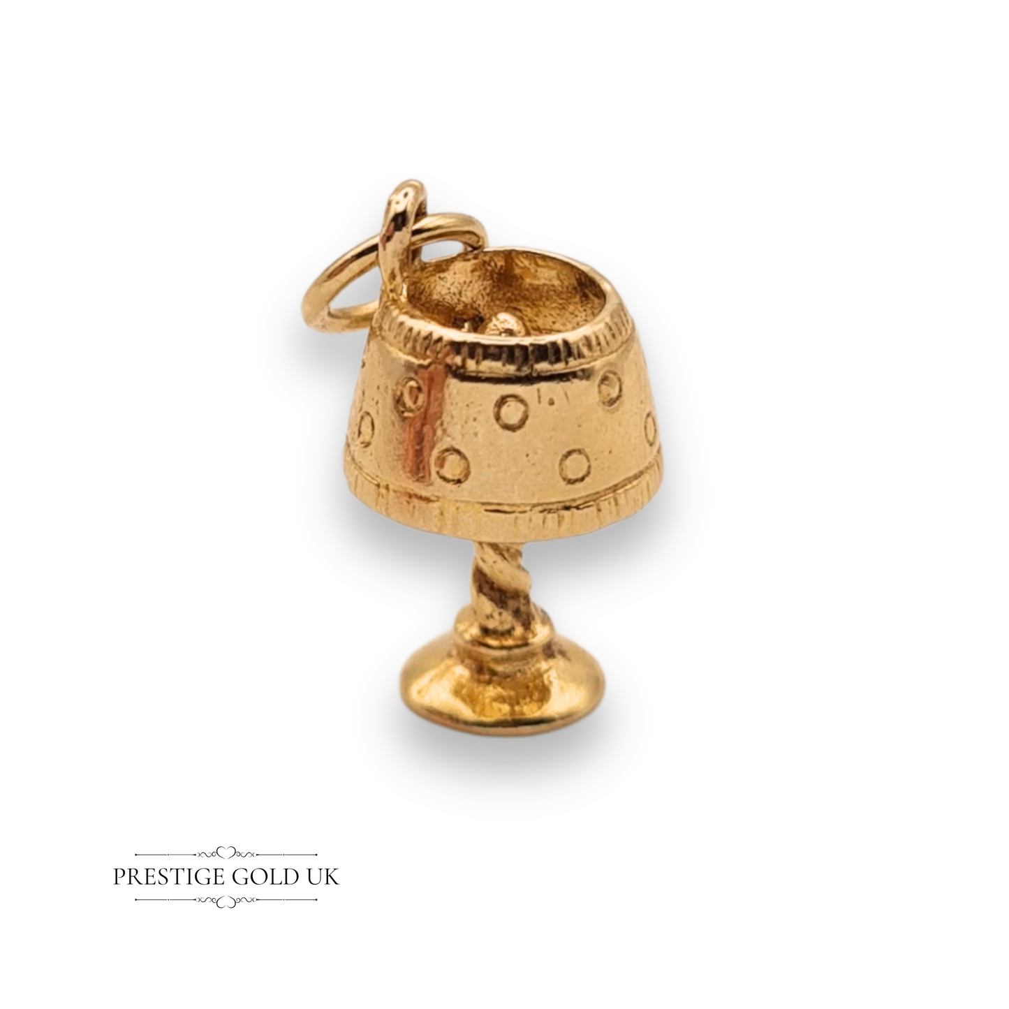 Whimsical 9ct yellow gold lamp charm with a dotted lampshade and twisted stem, 15mm x 9mm, featuring a polished finish and jump ring for attachment to bracelets or necklaces.