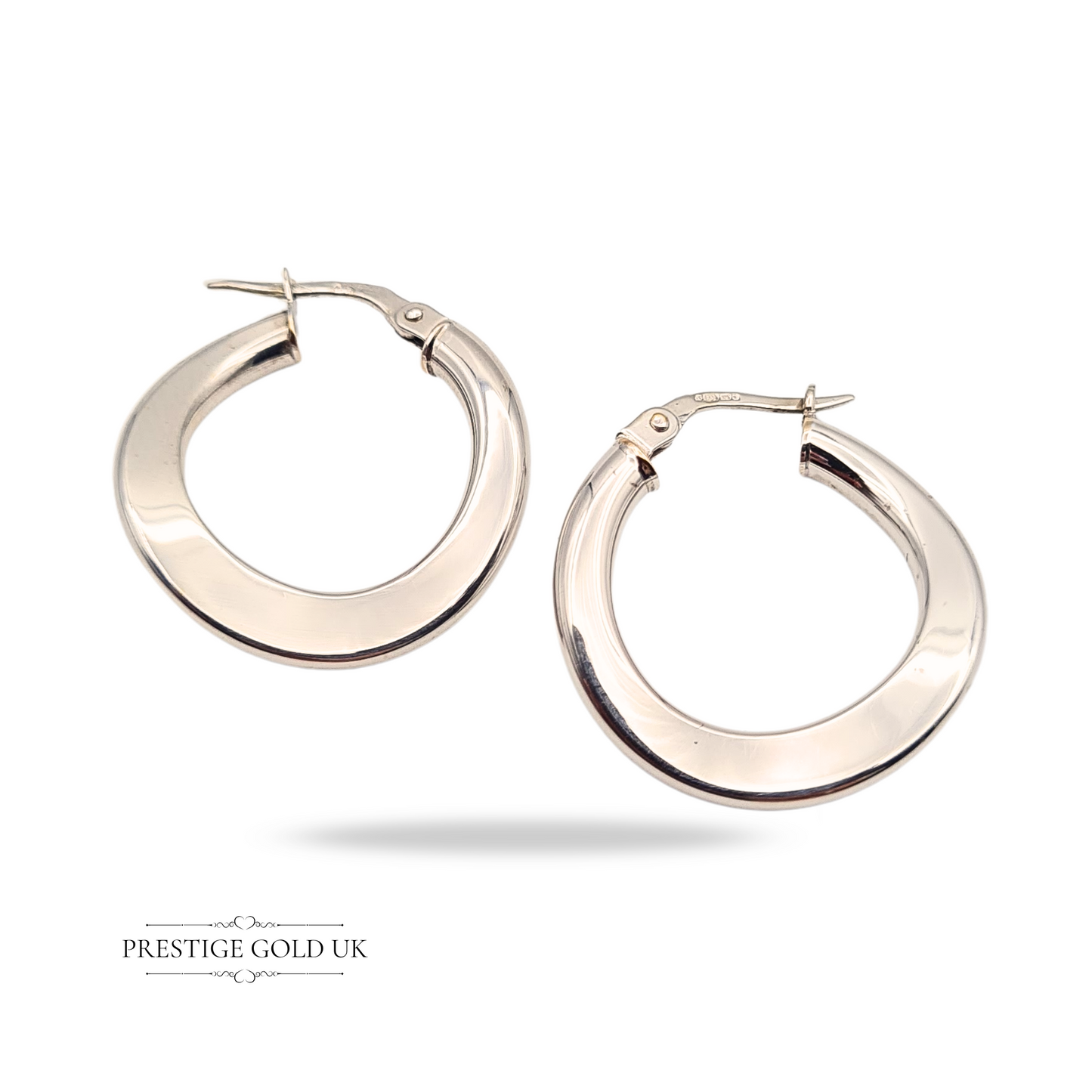 Pair of 9ct white gold wavy hoop earrings with sculptural twist design and flip top fasteners, 22mm wide and 2mm thick, lightweight and elegant
