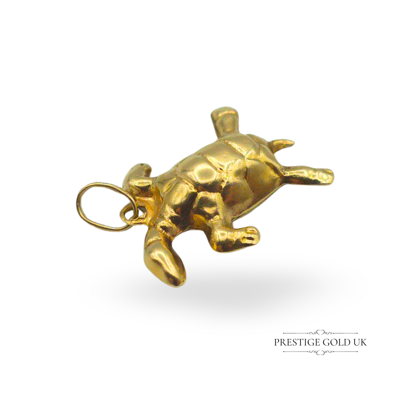 Tiny 14ct yellow gold sea turtle charm pendant, 18mm long, with tested hollow construction and realistic marine detail, perfect for nautical jewellery lovers or as a symbolic ocean-themed gift charm.