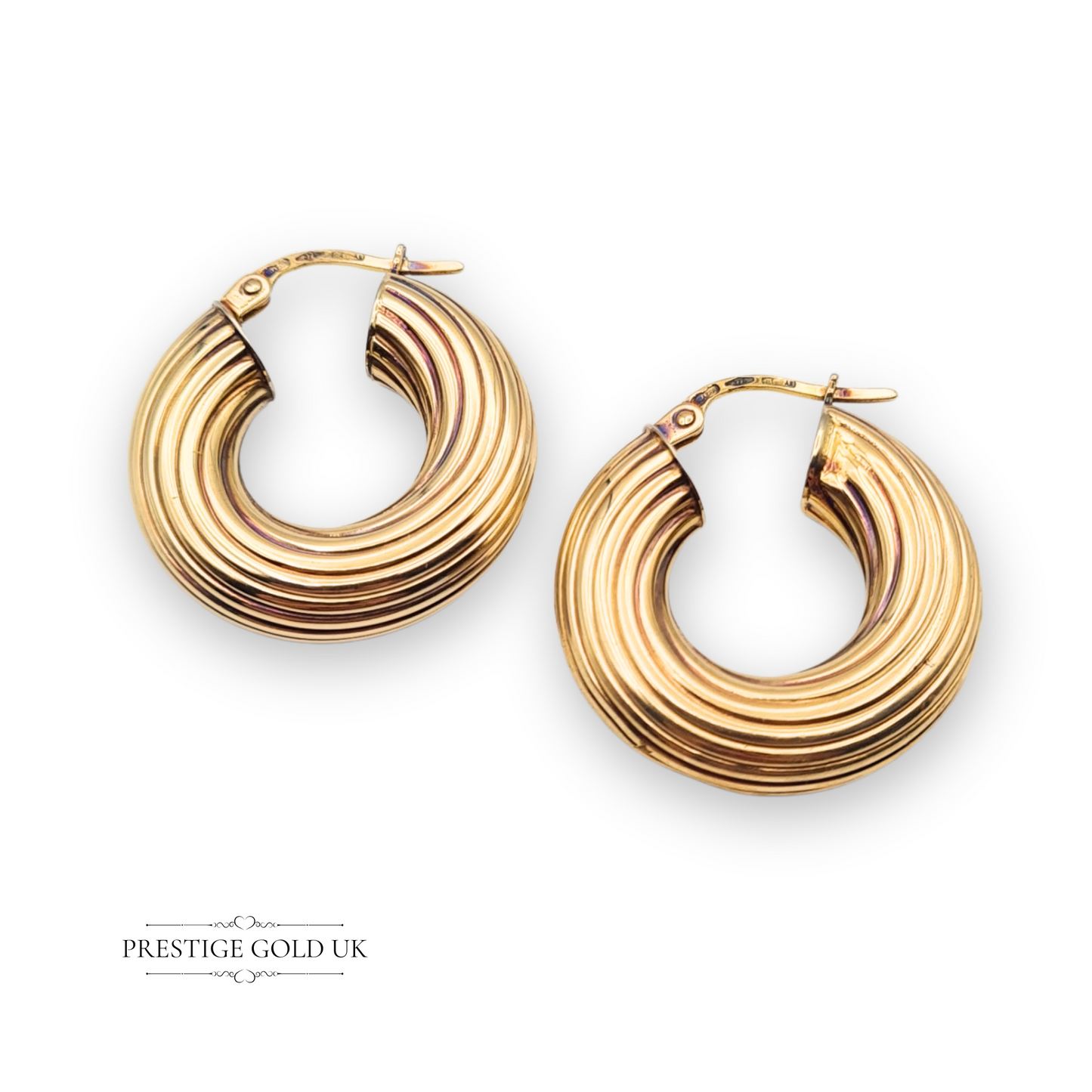 Pair of chunky 9ct gold flip top hoop earrings, 23mm by 26mm, with polished finish and secure hinged clasp, fully hallmarked by the London Assay Office, vintage bold style.