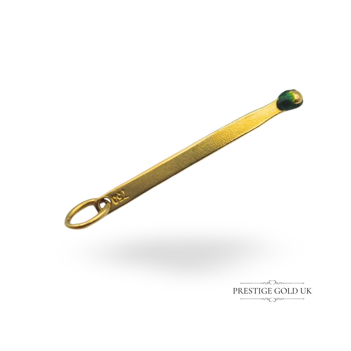 A vintage 18ct gold matchstick charm with a green enamel tip, measuring 37mm in length. Stamped 750 for authenticity, this solid gold novelty pendant is a unique and collectible piece, ideal for charm bracelets or as a statement pendant.