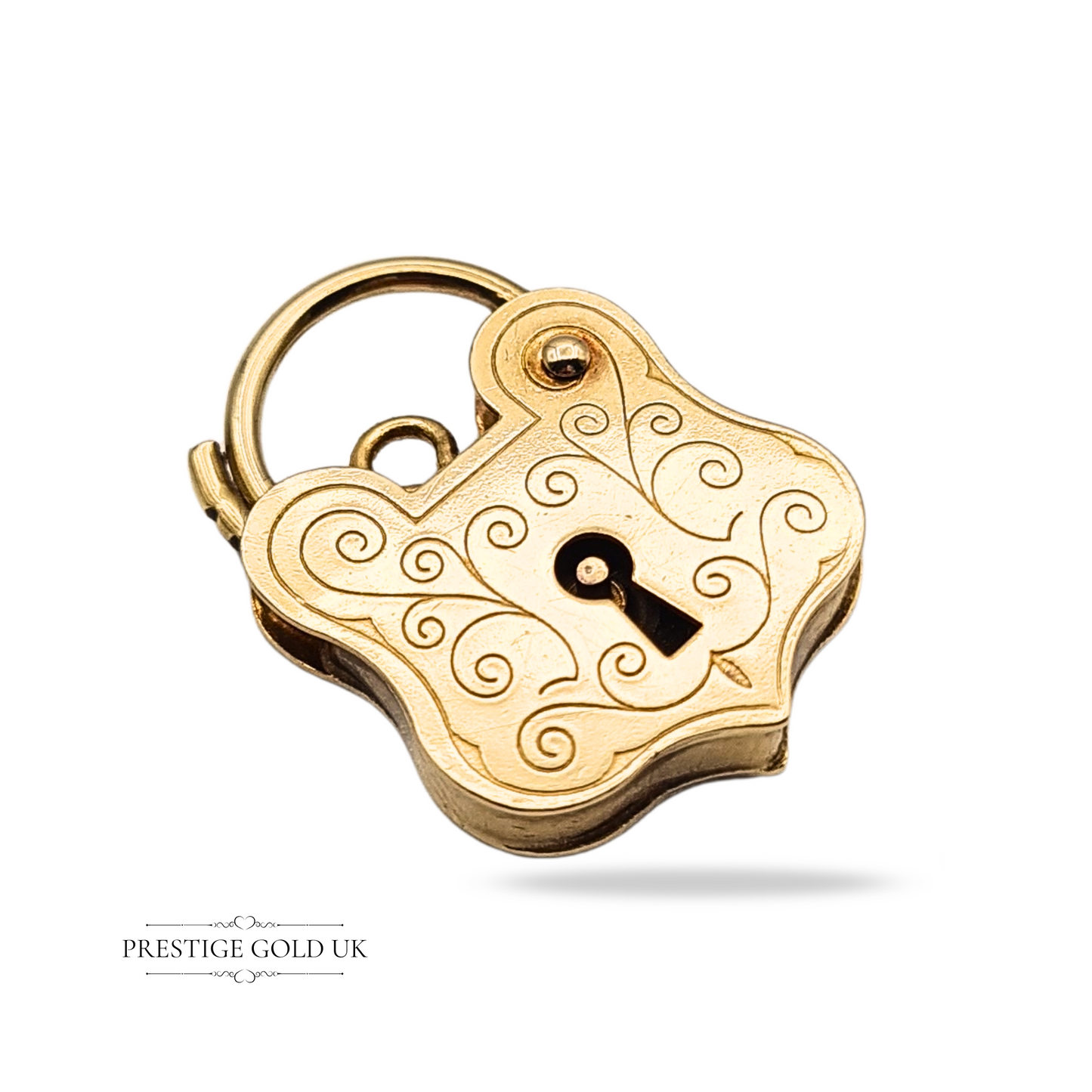 Vintage 9ct gold heart padlock charm with elegant scroll engraving on the front, dated 1995 and fully hallmarked London, 20mm tall with a working clasp mechanism, ideal as a bracelet fastener or romantic pendant.