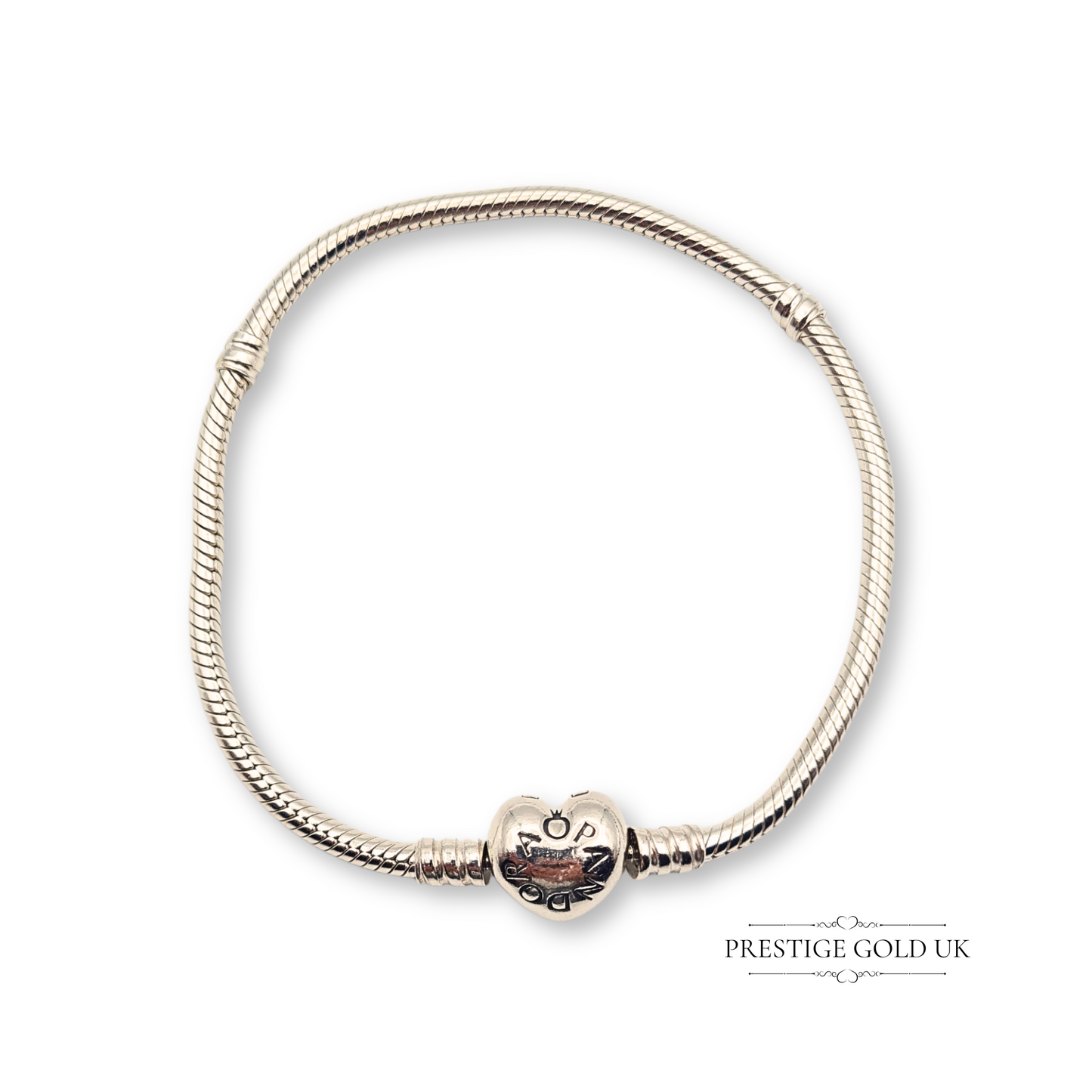 Authentic Pandora Moments sterling silver snake chain bracelet with heart-shaped clasp, stamped ALE 925. Measures 7.5 inches (19.5 cm) and weighs 15.84 g, a genuine Pandora piece professionally cleaned for brilliance.