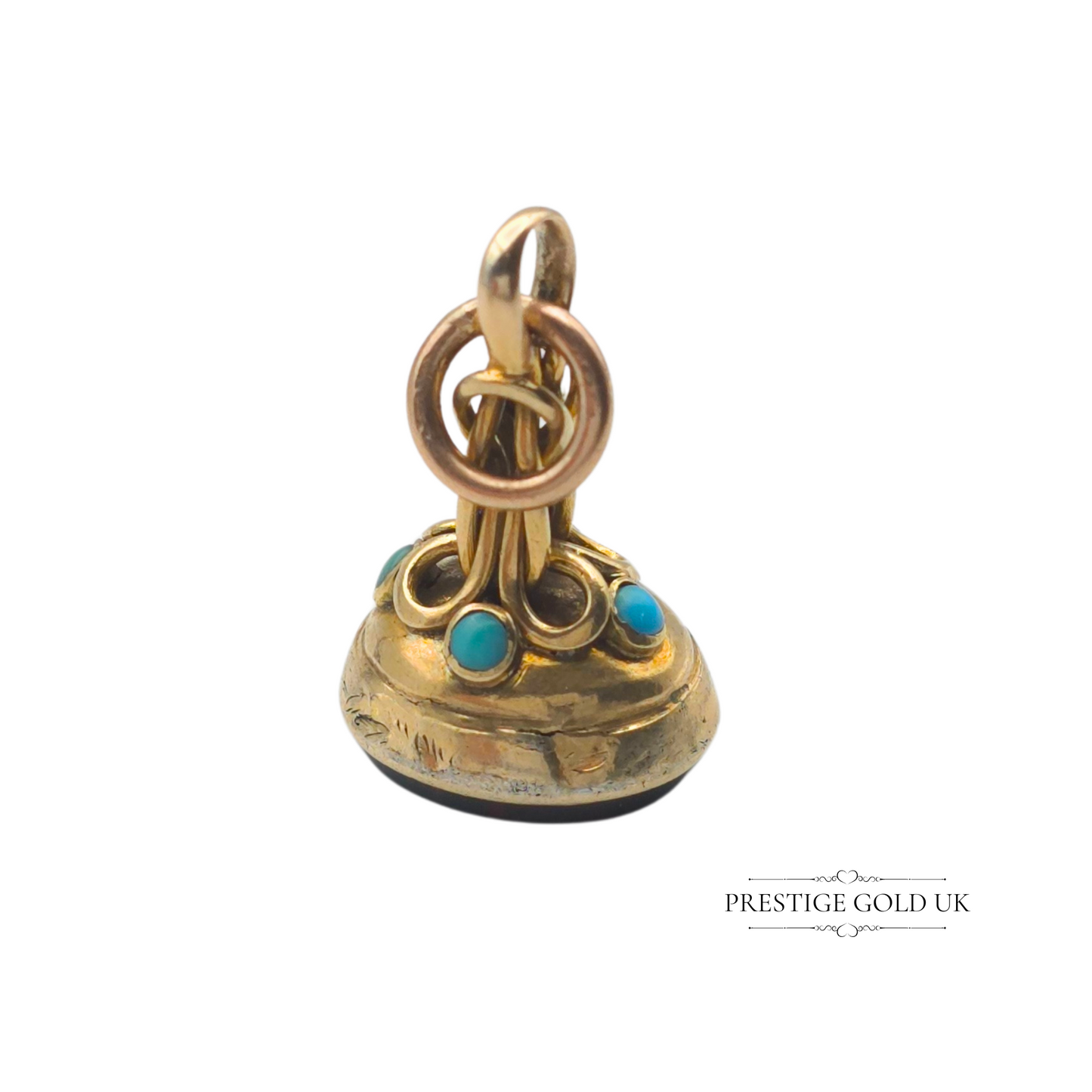 A macro shot of the turquoise embellishments, adding a touch of colour to the antique piece.