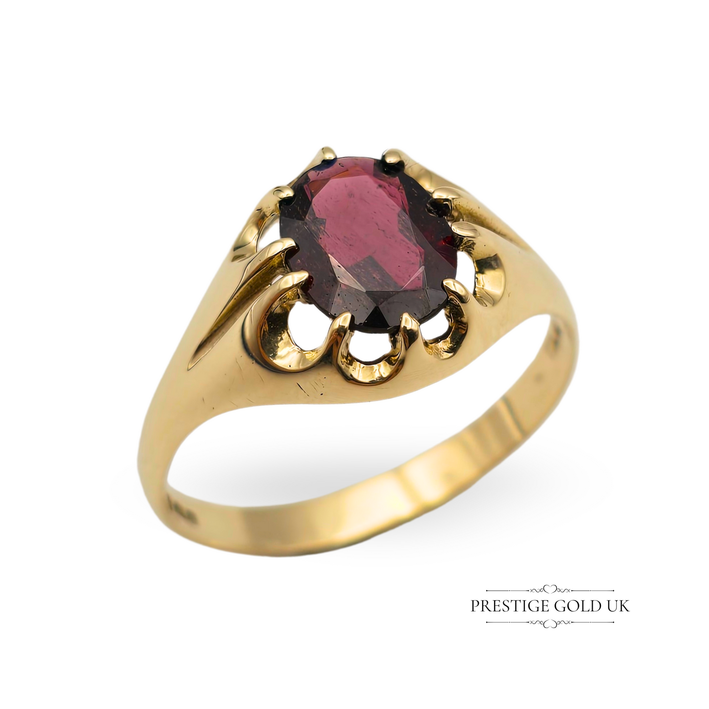 Vintage 9ct solid gold ring with deep red oval garnet in six-claw setting, hallmarked Birmingham 1979, UK V size, weighing 2.9g, bold and elegant design.