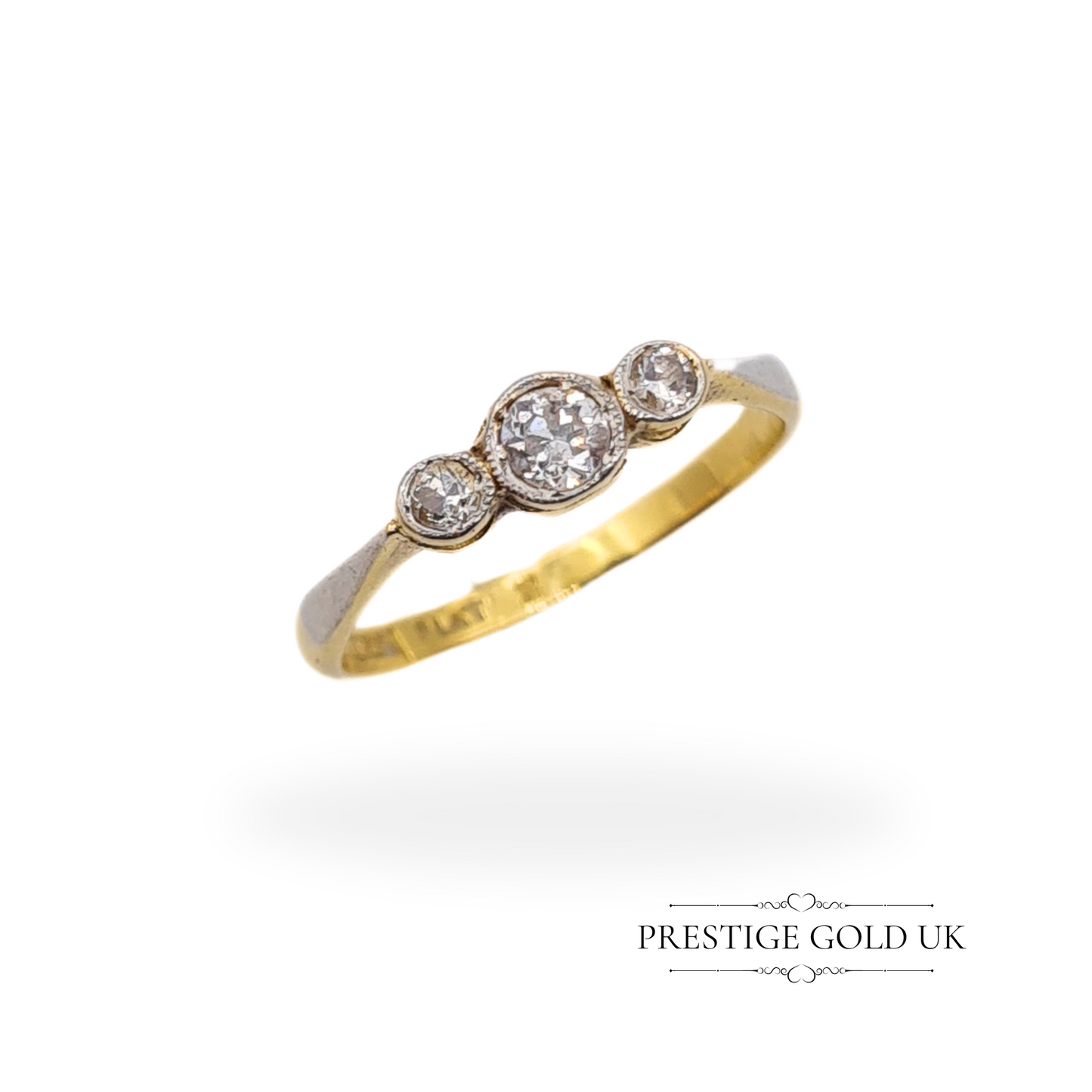 Front-facing view of the diamond trilogy ring, revealing its timeless appeal and refined craftsmanship.