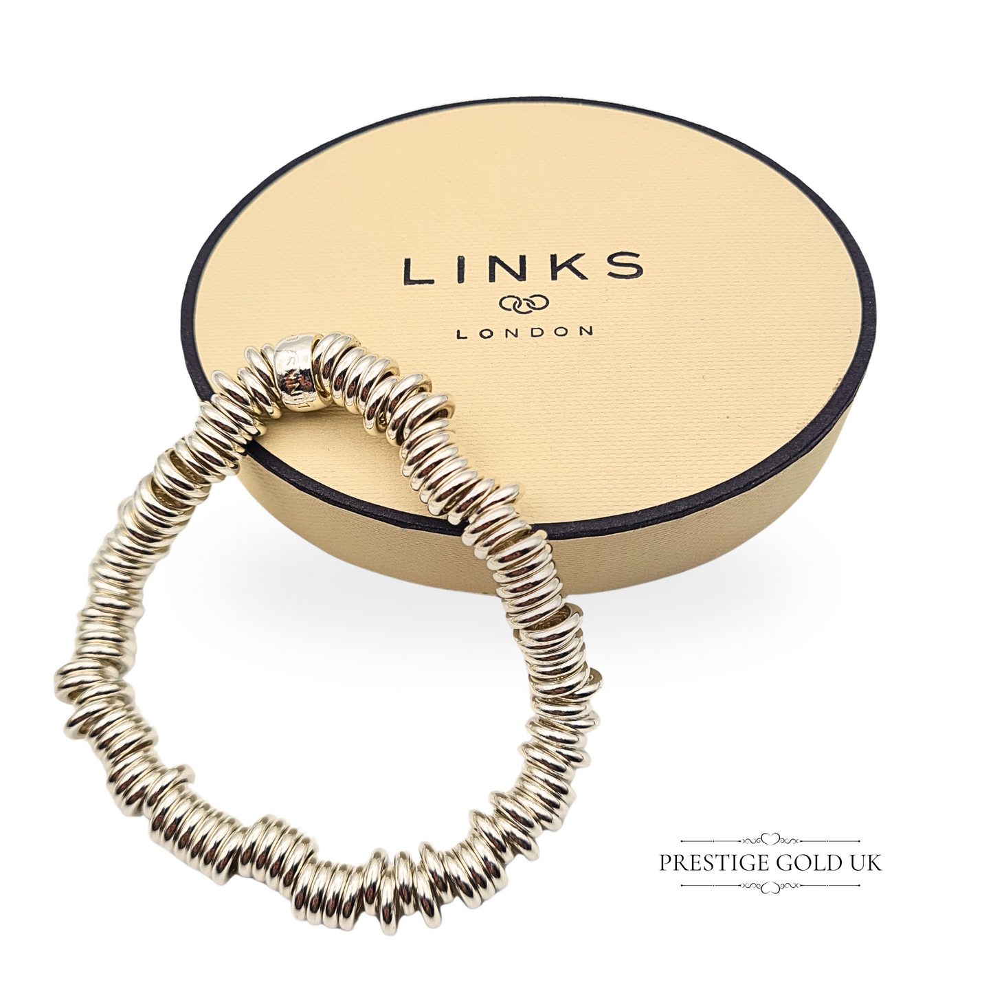 Photograph of a 925 sterling silver Links of London Sweetie bracelet featuring chunky stretch rings in a bold, iconic design, measuring 7 inches long, stamped, and ideal for statement wear or gifting, photographed on a white background.