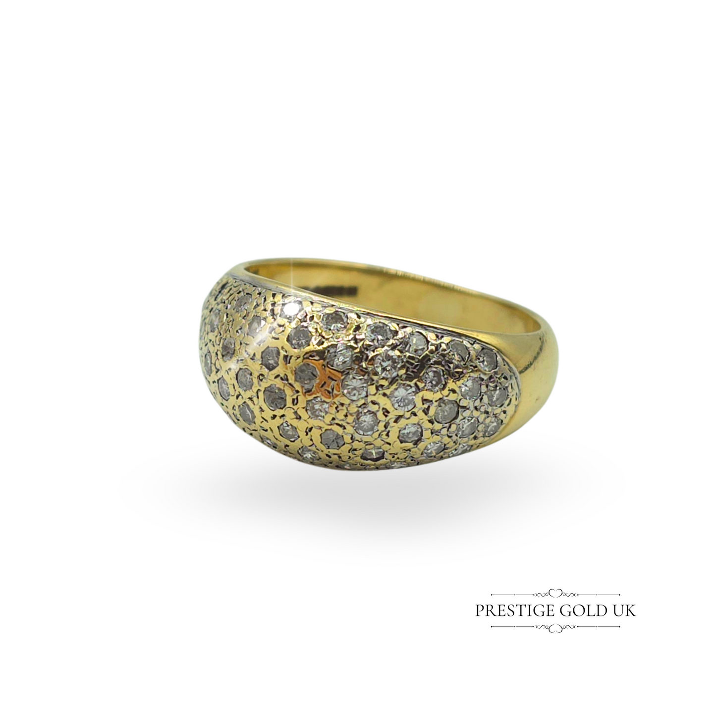 A vintage 18ct gold diamond pavé ring with a dome-shaped design, fully hallmarked in Birmingham in 1994. The elegant pavé setting features multiple sparkling diamonds, creating a sophisticated statement piece. A rare and luxurious ring, perfect as a gift or collector's item.