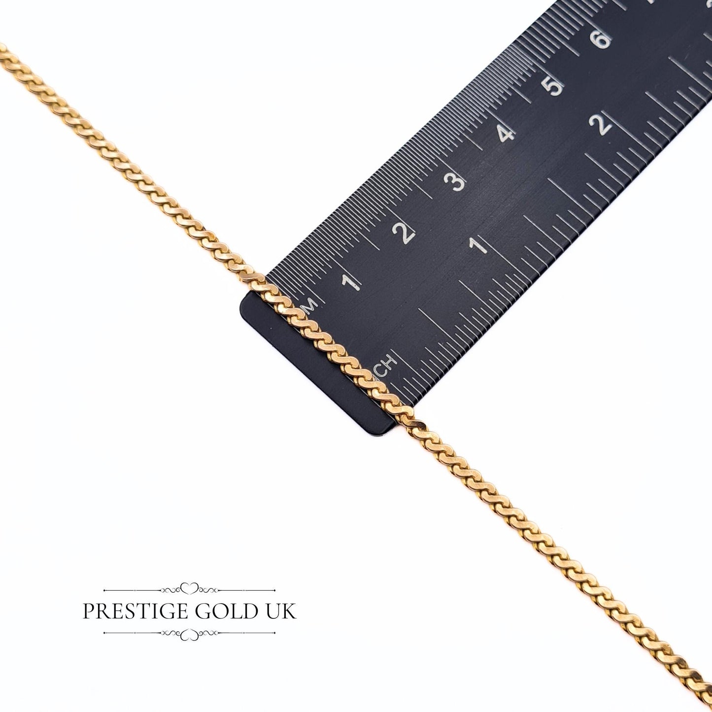 A heavy solid 9ct rose gold S-link necklace weighing 12.6 grams, 24 inches (62 cm) long and 2mm wide. Fully hallmarked for London with import marks, dated 1979. Vintage design with a warm rose gold hue, ideal for gifting or collecting.