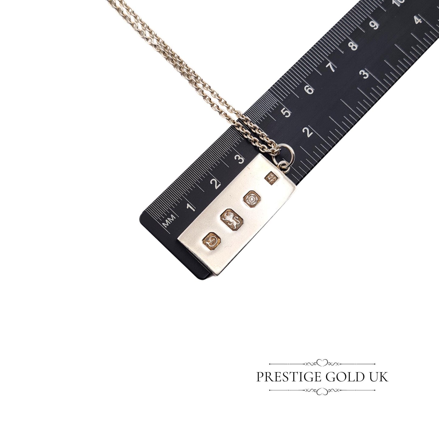 Vintage solid 925 sterling silver ingot pendant with a full Chester hallmark dated 1979, measuring 37mm tall and 15mm wide, on a 20-inch chain. A substantial 21.5g piece, perfect for vintage jewellery collectors or as a unique gift.