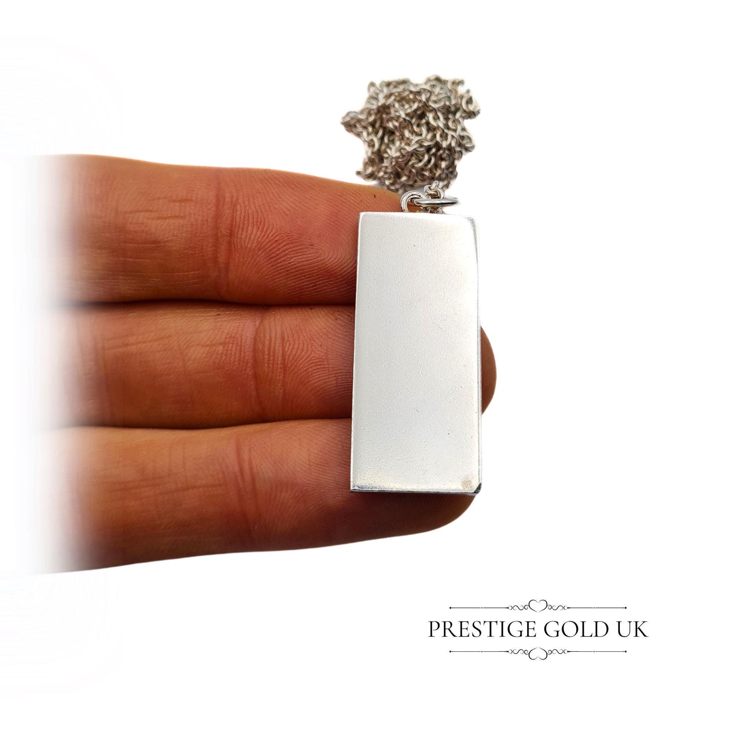 Vintage solid 925 sterling silver ingot pendant with a full Chester hallmark dated 1979, measuring 37mm tall and 15mm wide, on a 20-inch chain. A substantial 21.5g piece, perfect for vintage jewellery collectors or as a unique gift.