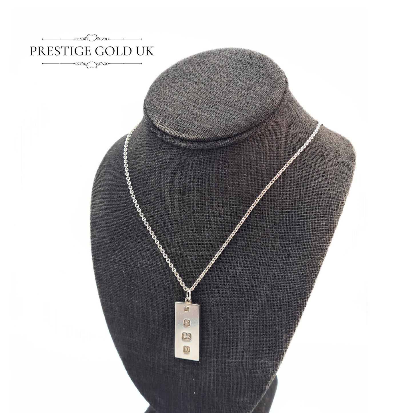 Vintage solid 925 sterling silver ingot pendant with a full Chester hallmark dated 1979, measuring 37mm tall and 15mm wide, on a 20-inch chain. A substantial 21.5g piece, perfect for vintage jewellery collectors or as a unique gift.