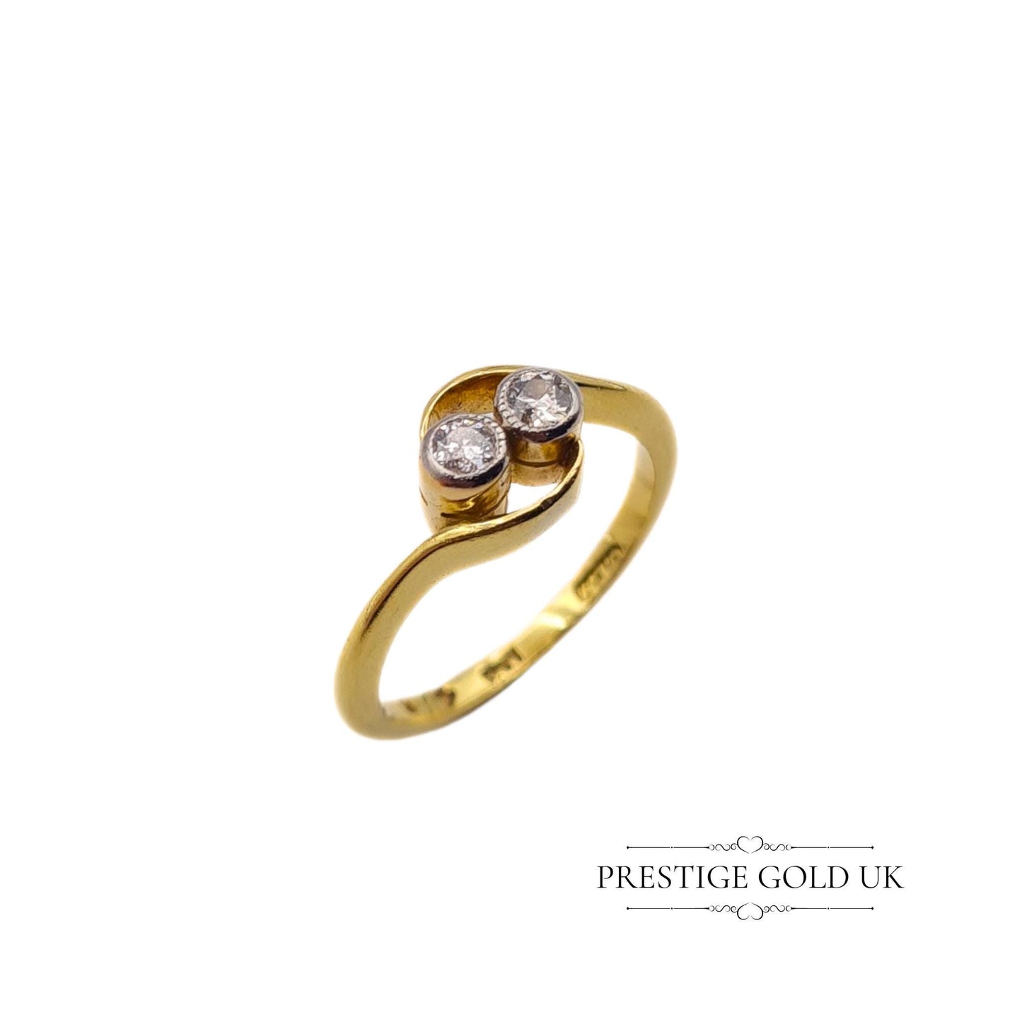 18ct gold crossover ring featuring two 0.03-carat diamonds, size UK I, with a stamped 18K hallmark and 2.6 grams weight. Elegant design with delicate diamond accents, perfect for a refined, sophisticated look.