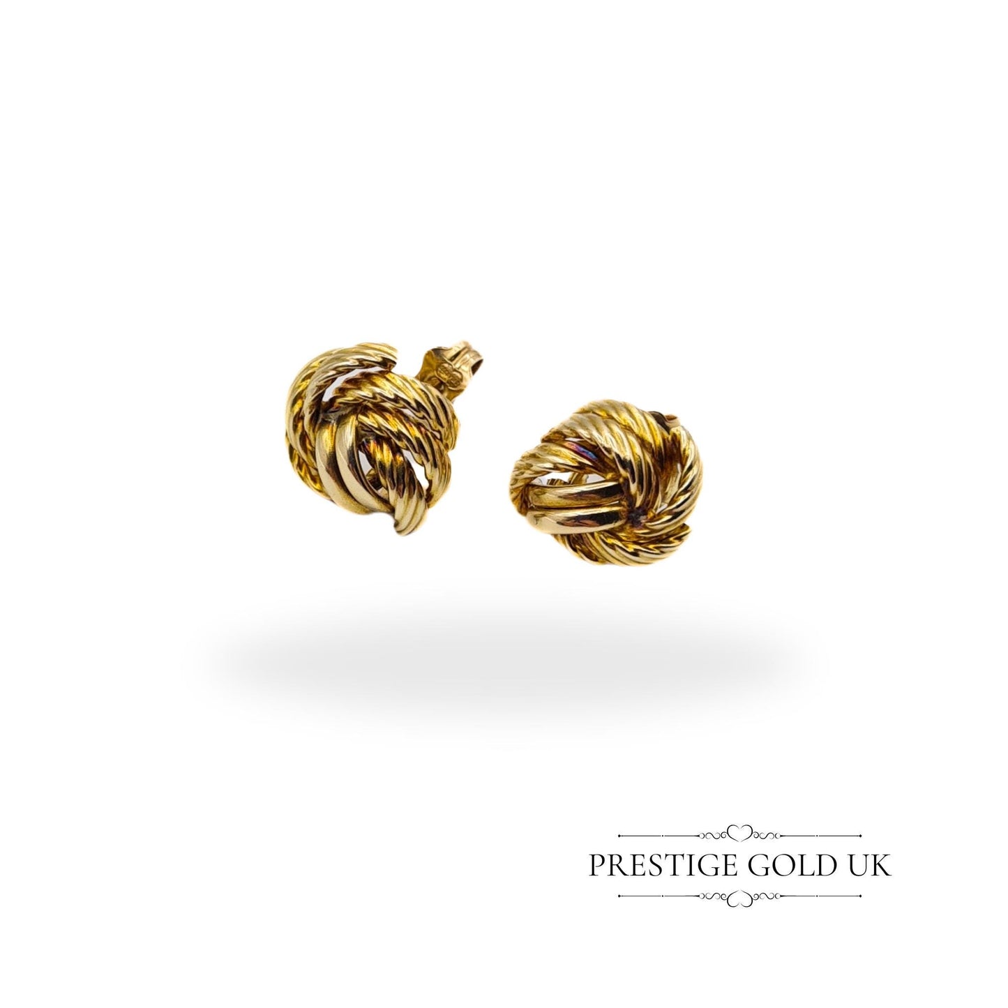 Close-up of vintage 9ct gold twisted knot stud earrings, showcasing their intricate design and polished finish.