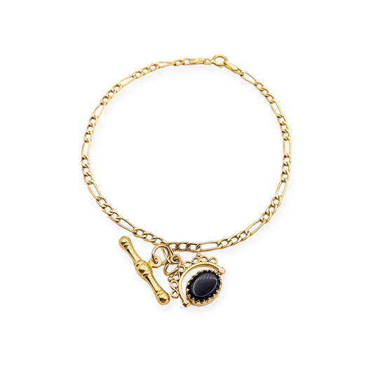 9ct gold Figaro bracelet with T-bar and spinning fob charm