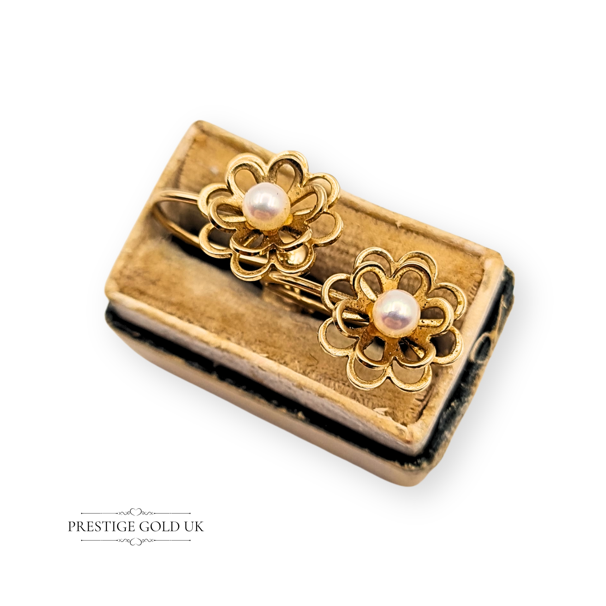 Vintage 9ct gold screw-back earrings with open-petal floral design and 3.5mm cultured pearl centres. Hallmarked in Birmingham, weighing 2.12g. Elegant women’s gold earrings with secure screw fittings, 11mm face.