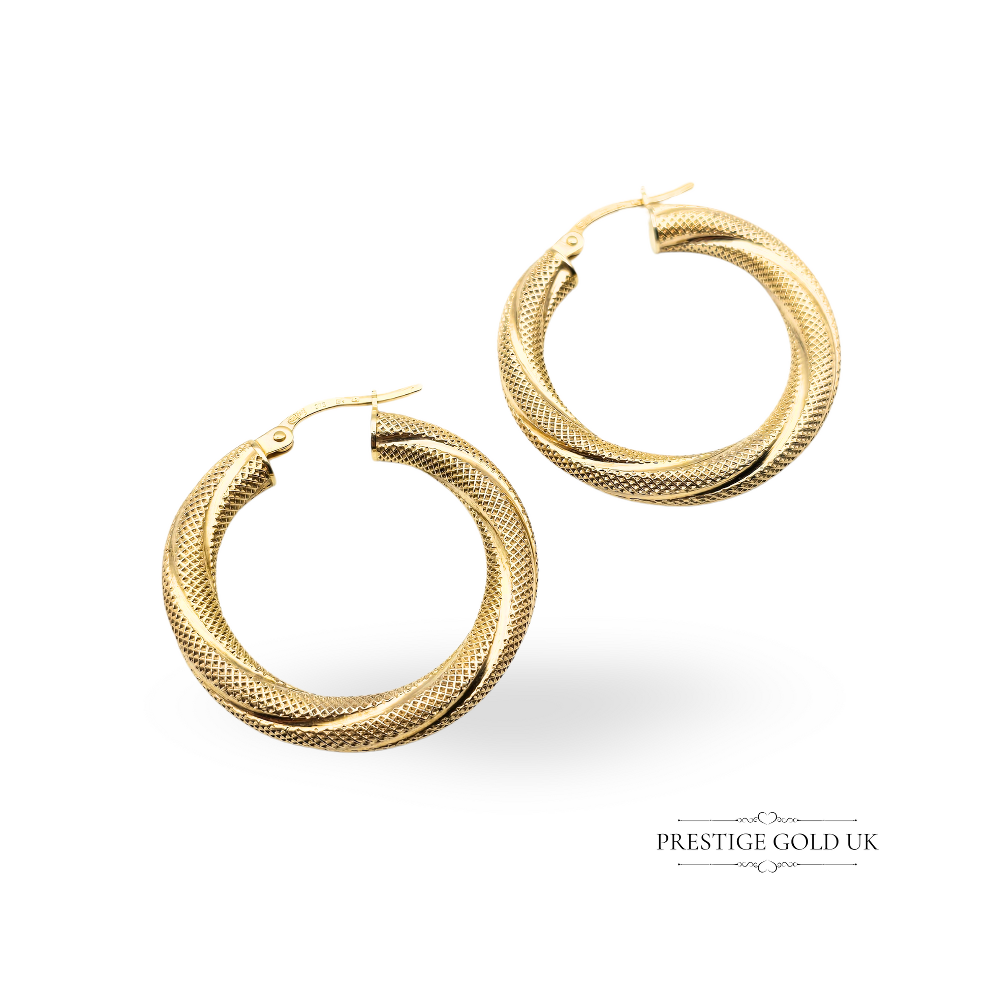 Close-up image of large 9ct gold round hoop earrings with flip-top clasp and two-tone textured finish, fully hallmarked by the Sheffield Assay Office.