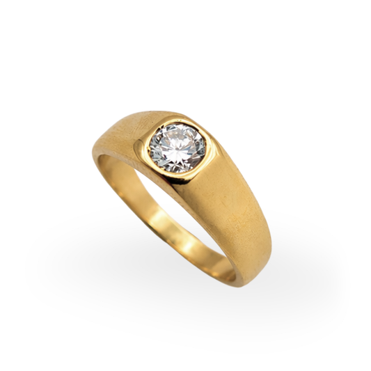 Gold ring with a diamond on a white background