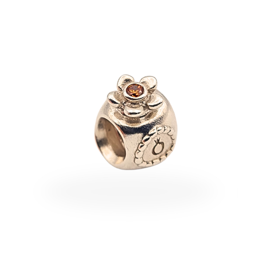Rare genuine Pandora ALE 925 sterling silver perfume bottle charm with orange cubic zirconia flower detail.