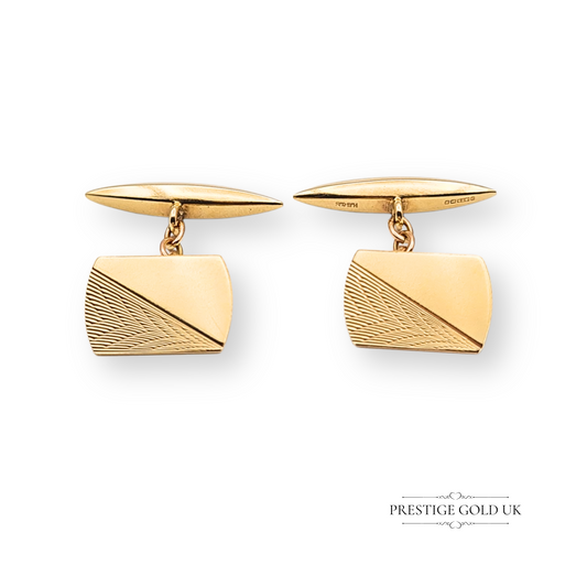 Vintage 9ct gold gents cufflinks, London 1991 hallmark, weighing 3.6g with 15x10mm rectangular faces featuring a fine etched geometric design, classic chain link backs with torpedo ends, polished and in excellent condition.