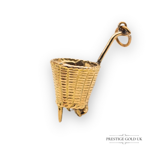 Vintage 9ct gold charm in the form of a wicker fruit picking basket with handle and feet, fully hallmarked Birmingham 1965, 33mm long and finely detailed in yellow gold.

