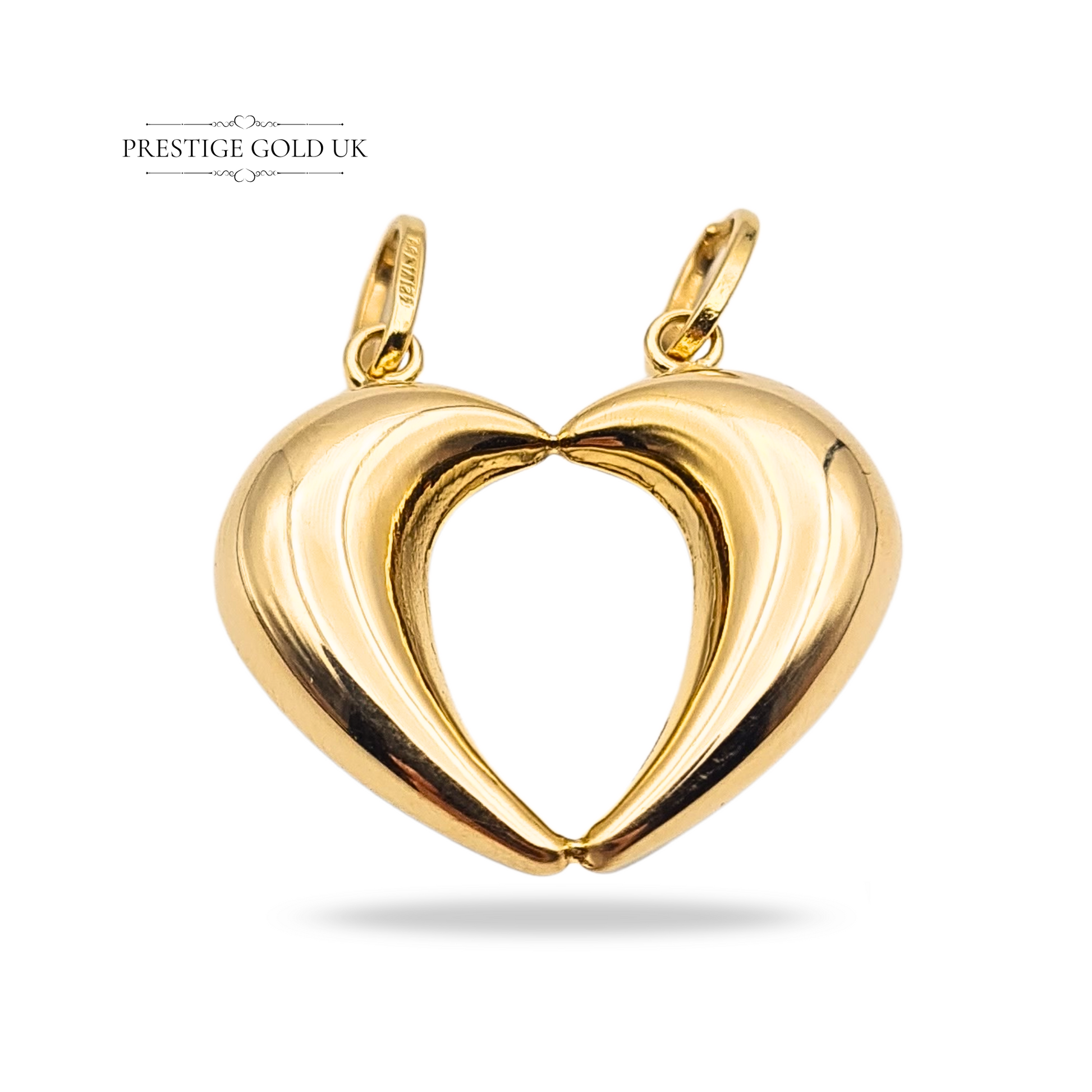 18ct gold split pendant in two tone yellow and white gold, stamped 750 and fully tested, weighing 3.1g with a 21x23mm hollow design. A symbolic split heart charm, perfect as a best friend keepsake or meaningful gold gift.