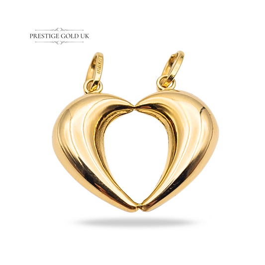 18ct gold split pendant in two tone yellow and white gold, stamped 750 and fully tested, weighing 3.1g with a 21x23mm hollow design. A symbolic split heart charm, perfect as a best friend keepsake or meaningful gold gift.