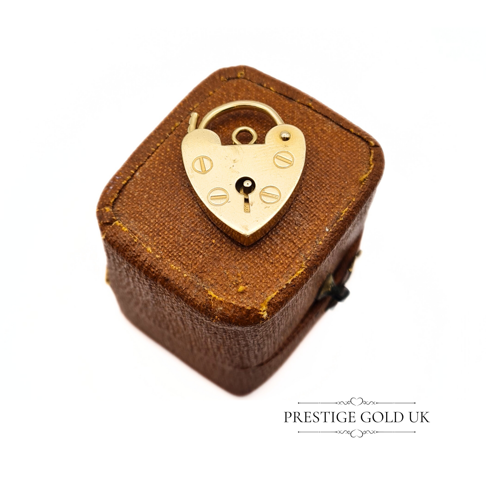 Front view of the heart padlock charm, highlighting its intricate clasp design and functional lock mechanism.
