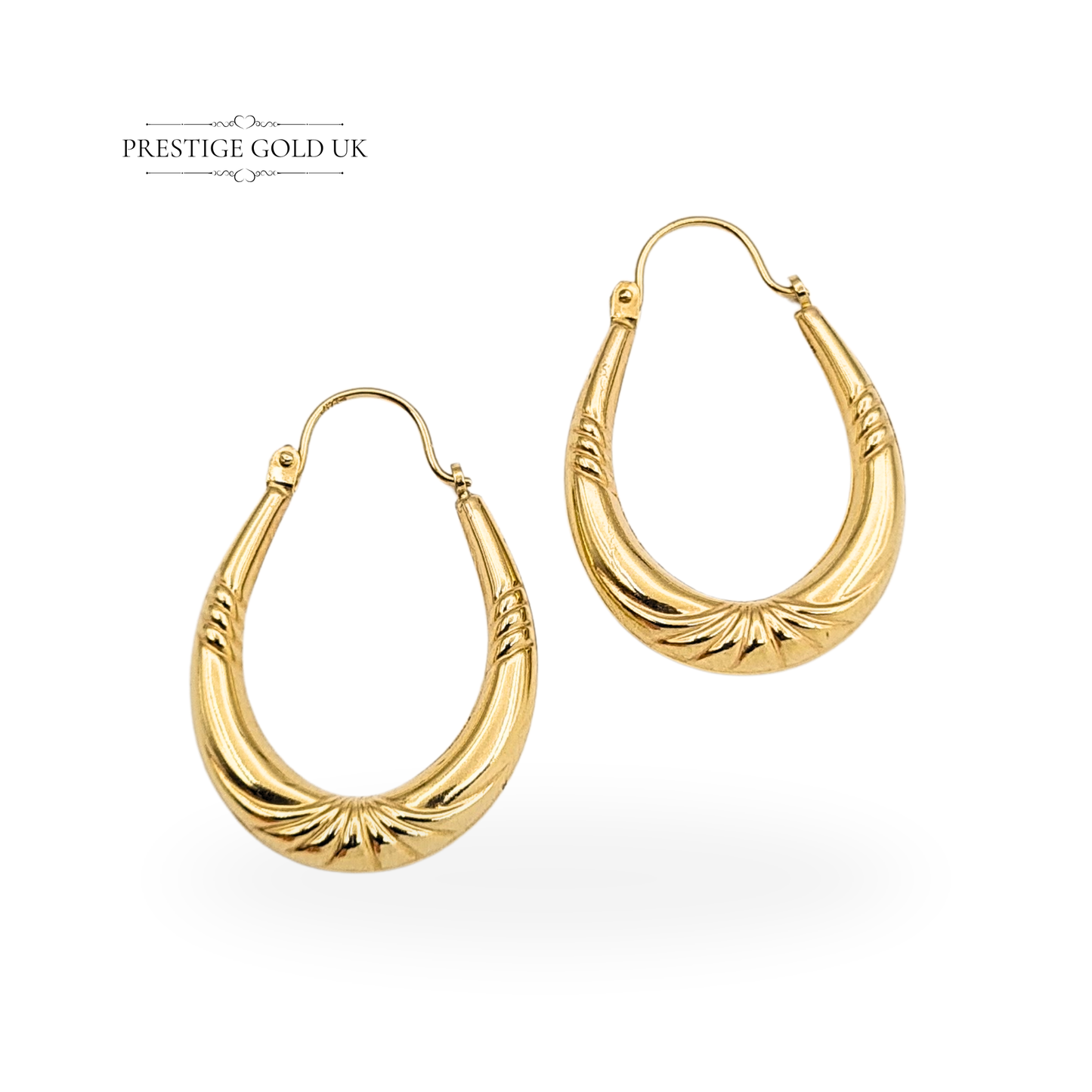 9ct gold oval creole hoop earrings, stamped 375 and fully tested. Hollow 9ct yellow gold, 28mm tall x 14mm wide x 4mm thick, secure flip-top fasteners, polished finish, lightweight 1.52g, elegant and comfortable everyday wear.