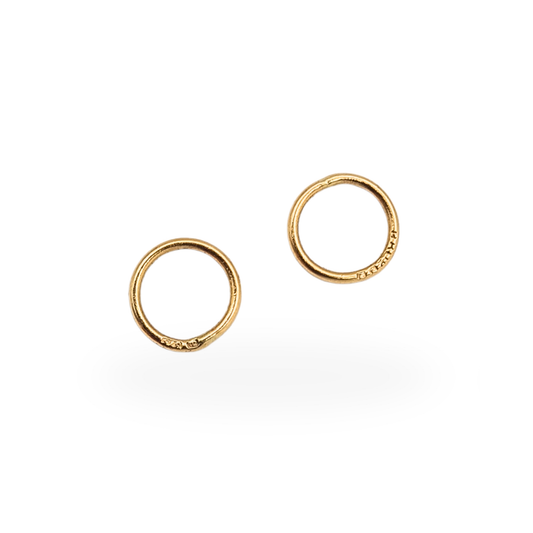 Pair of hallmarked 9ct gold closed jump rings with 375 marks, suitable for jewellery repair and restoration.