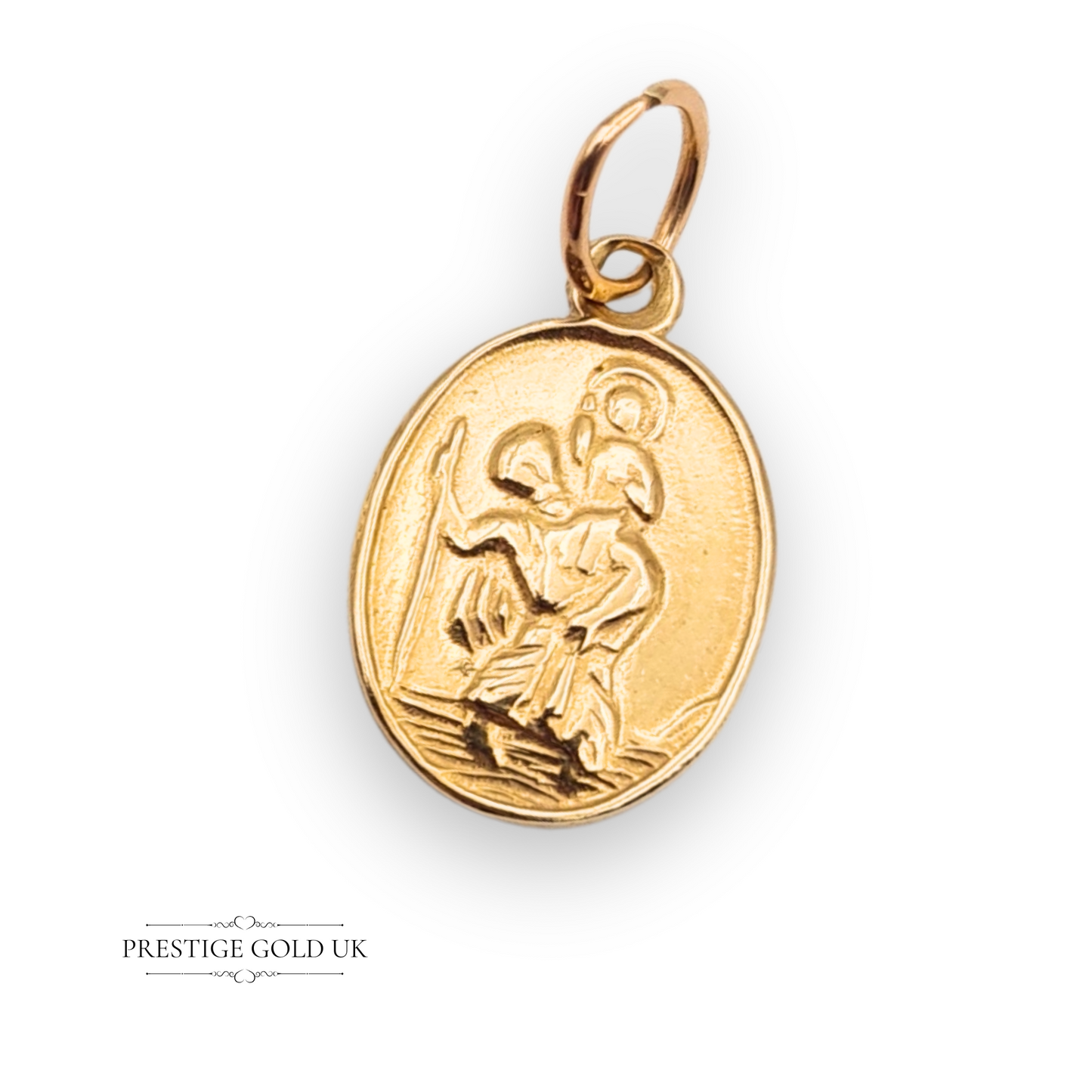 Small vintage St Christopher charm in solid 9ct gold, oval shape with engraved saint image, 15mm x 10mm, fully hallmarked Birmingham 1963 with WJS maker's mark, religious medal for travel protection or faith jewellery