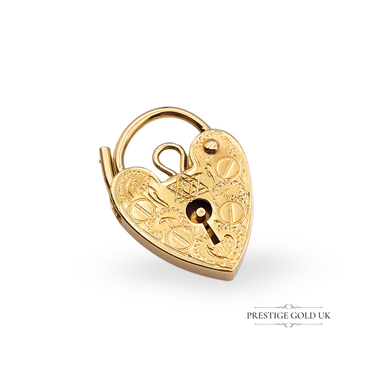 Vintage 9ct gold heart-shaped padlock charm with hand-engraved Star of David, hallmarked London 1977, measuring 18mm. A symbolic and collectible Judaica gift, perfect as a clasp or pendant, crafted in solid 375 gold with fine detail.