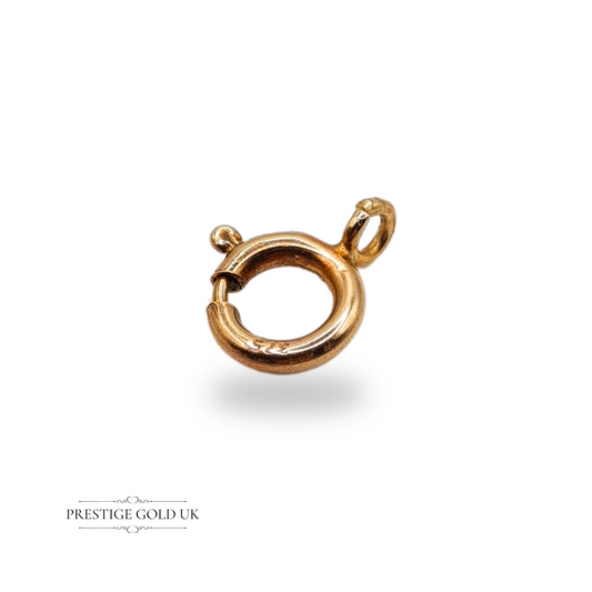Close-up of a 9ct yellow gold spring ring clasp stamped 375, measuring 12mm x 10mm, ideal for jewellery repairs or gold jewellery making projects



