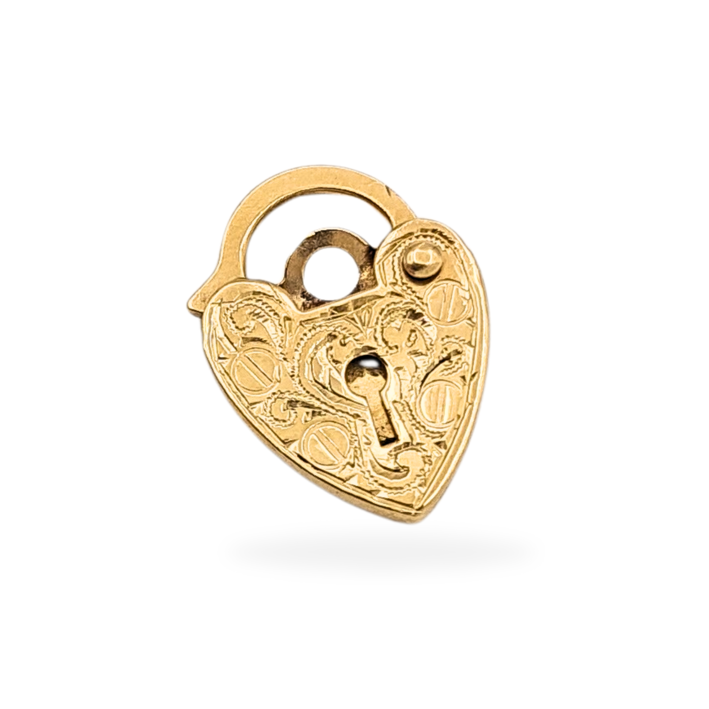 Tiny 9ct yellow gold heart padlock clasp stamped ASJ 375, weighing 0.54g and measuring 13x10x1.5mm. Hand engraved with ornate scrollwork, slightly flattened from age. Ideal as a gold bracelet clasp, pendant charm, or keepsake accent.