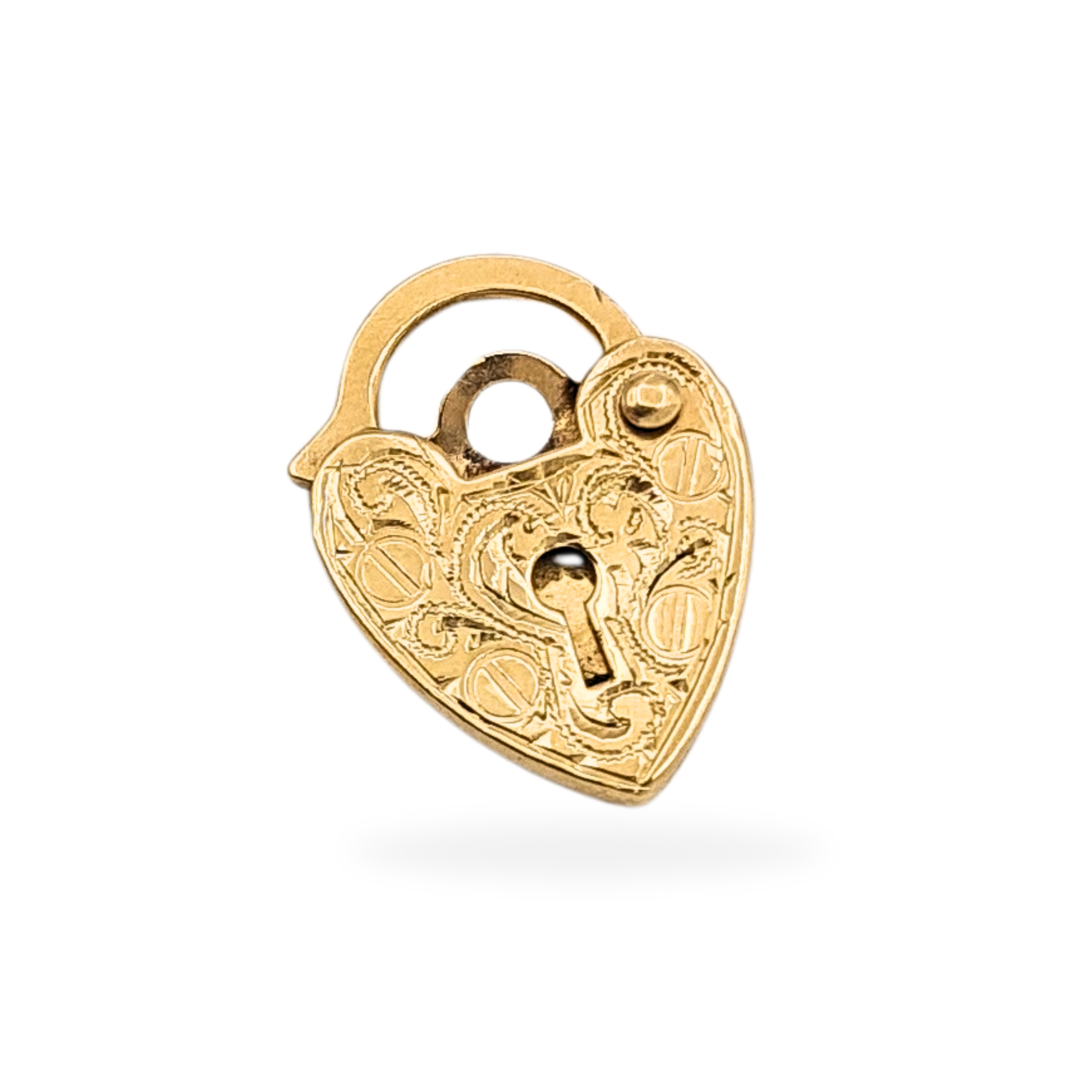 Tiny 9ct yellow gold heart padlock clasp stamped ASJ 375, weighing 0.54g and measuring 13x10x1.5mm. Hand engraved with ornate scrollwork, slightly flattened from age. Ideal as a gold bracelet clasp, pendant charm, or keepsake accent.