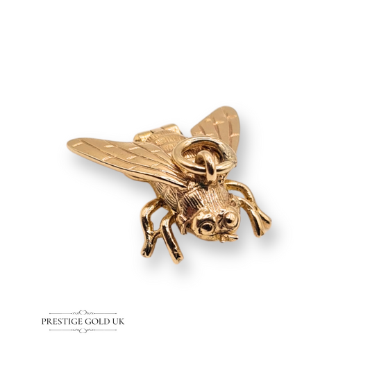 9ct yellow gold wasp charm with Birmingham hallmark dated 1965, featuring detailed insect wings and legs, opens to reveal a stinger, 16mm by 18mm, novelty nature jewellery
