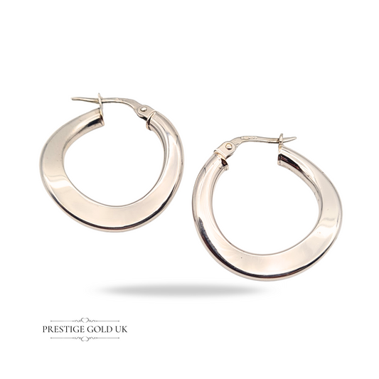 Pair of 9ct white gold wavy hoop earrings with sculptural twist design and flip top fasteners, 22mm wide and 2mm thick, lightweight and elegant