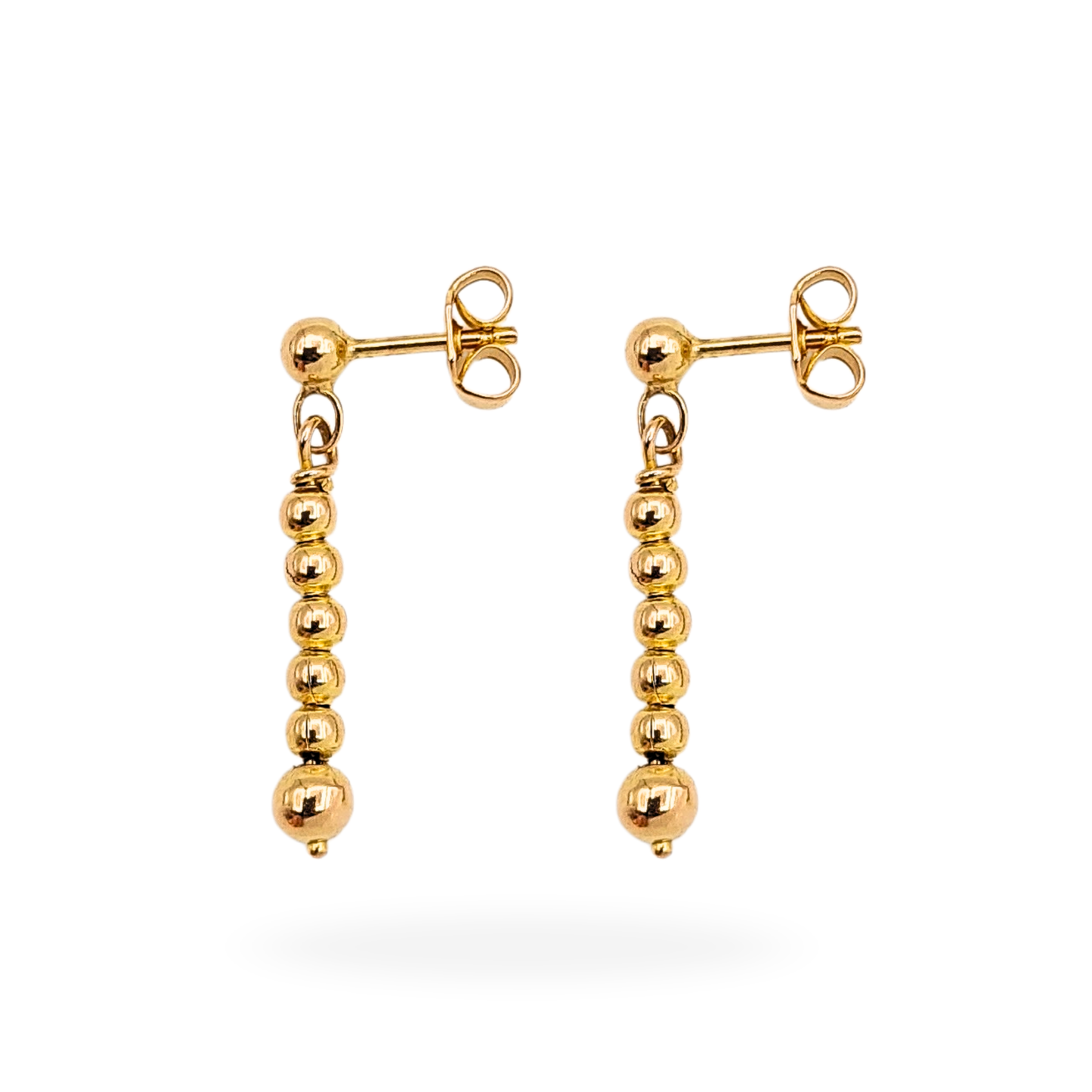 Pair of 9ct gold bead drop earrings with 25mm drop, polished finish and butterfly backs. Lightweight at 1.47g, stamped 9k on the backs, featuring small graduated gold beads for a refined, minimalist look. Perfect for everyday wear or gifting.