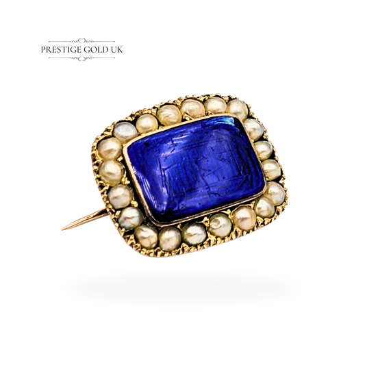 Antique 9ct gold brooch featuring a rich cobalt blue enamel centre surrounded by natural seed pearls, tested for gold purity, Georgian-style design measuring 18x14mm, minor enamel chip, weighing 2.98g, beautifully crafted and full of antique charm.