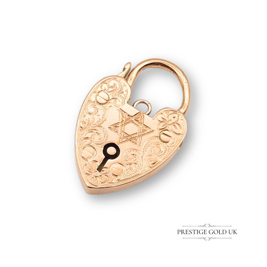 Antique 9ct rose gold heart padlock charm engraved with Star of David and floral scrollwork, measuring 25mm x 16mm with WJS hallmark