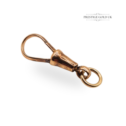 Lightweight antique 9ct rose gold dog clip clasp with worn 9CT hallmark, measuring 23mm x 7mm, Victorian era fastener ideal for charms or Albert chains, weighing just 1.14g.
