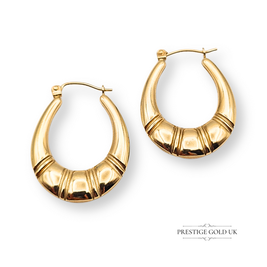 Pair of 9ct gold Creole hoop earrings with flip top clasp, hollow and lightweight design, 25mm tall by 19mm wide, polished ridged texture, vintage-inspired style