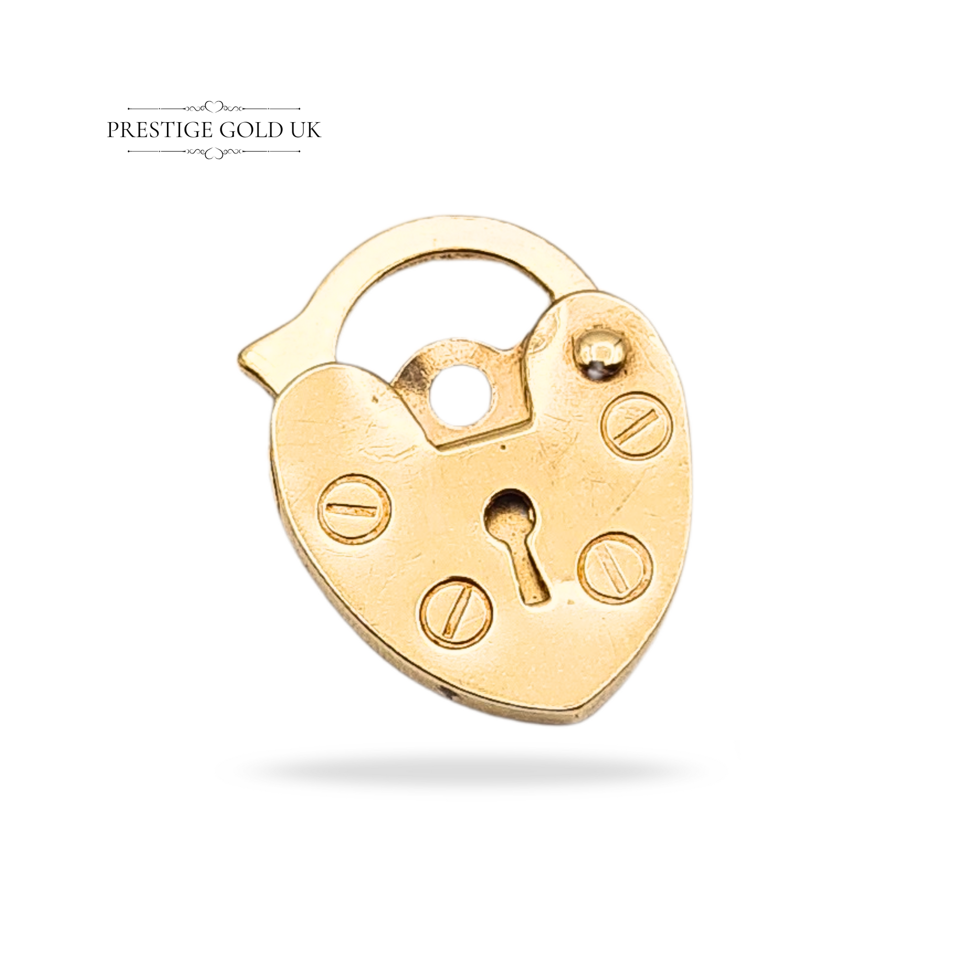Vintage 9ct gold heart padlock charm, London hallmark 1978, weighing 0.5g and measuring 13x10mm with a slim 1mm depth. A tiny opening lock design, perfect as a bracelet clasp or delicate pendant, in excellent vintage condition.