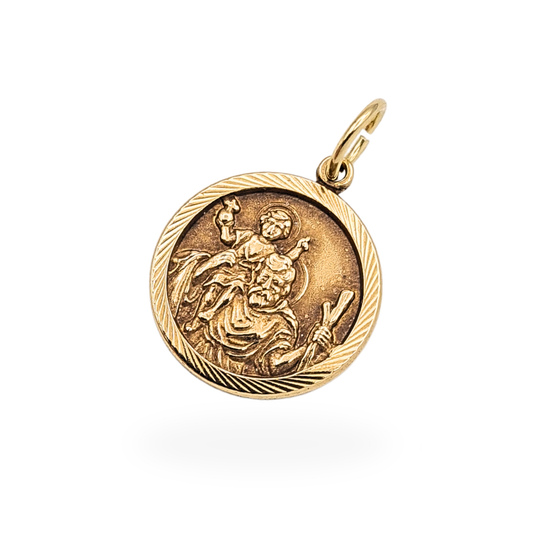 9ct gold St Christopher pendant charm with raised religious figure in circular design, approx 13mm diameter with textured border, Birmingham 1976 hallmark and maker mark to reverse, small vintage gold devotional charm with fine detail