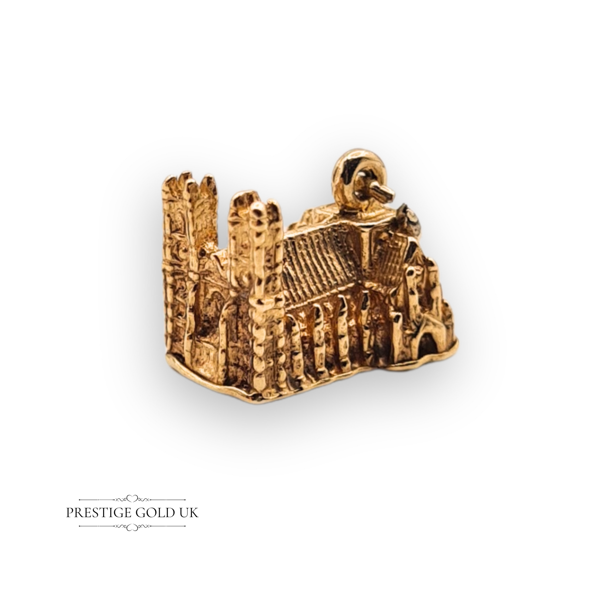 Miniature 9ct gold Westminster Abbey charm pendant with detailed architecture, vintage collectible UK landmark in solid gold with worn hallmark and engraved base.
