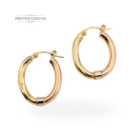 9ct tri-colour oval hoop earrings crafted from yellow, white and rose gold, stamped 375 and fully tested. Measuring 23mm tall by 17mm wide with 3.8mm thickness, vintage flip-top fasteners, lightweight 1.7g, elegant polished finish.