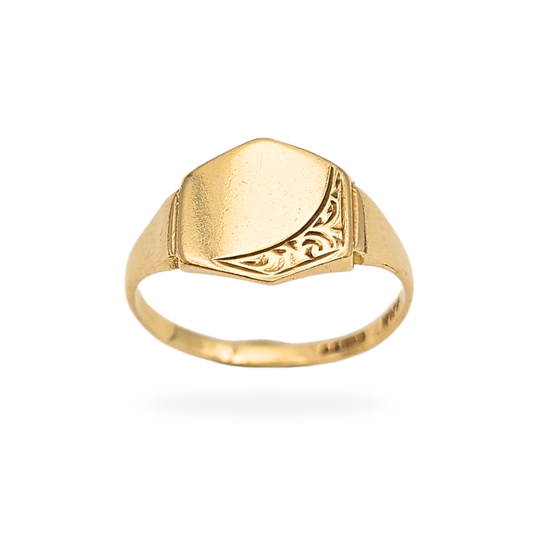 Vintage 9ct gold pinky signet ring with a hexagonal geometric face measuring 9 × 9mm, hallmarked Birmingham 1985. UK size G US 3 1/4, weighing 1.09g. Small solid gold signet with smooth face and light age wear, photographed from multiple angles.